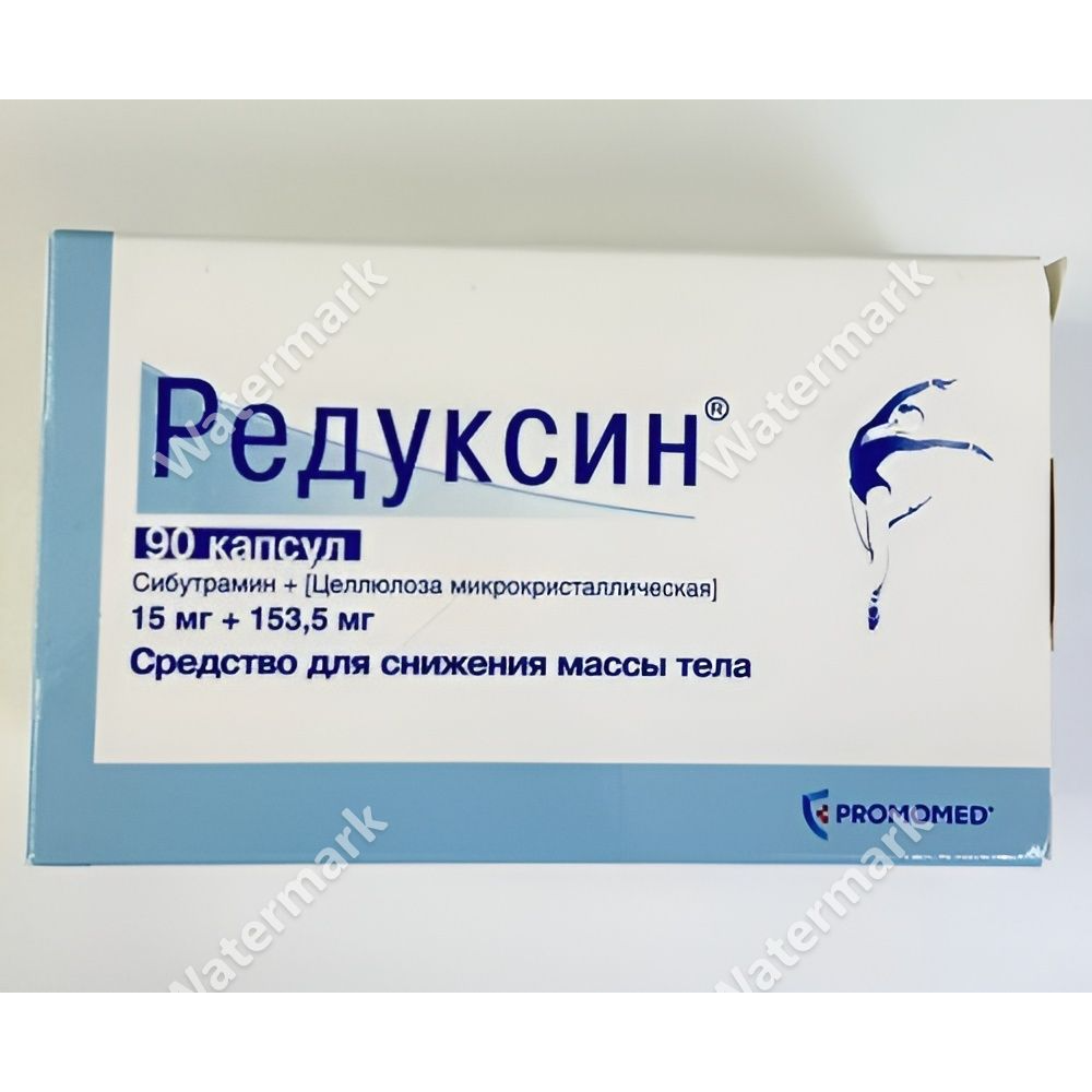 Бело-голубая картонная упаковка препарата Редуксин (сибутрамин + микрокристаллическая целлюлоза). На лицевой стороне указана дозировка 15 мг + 153,5 мг и количество — 90 капсул. Справа изображен силуэт танцующей балерины, внизу логотип компании Промомед.